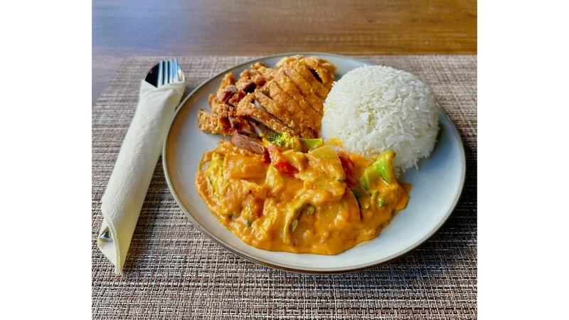 Rață în sos de curry